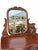 A stunning antique tallboy dresser featuring a classic serpentine curved front, five spacious drawers, and an attached...