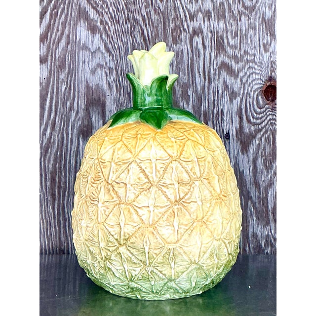 Make a bold statement with this vintage monumental glazed pineapple, a striking decorative piece perfect for adding a...