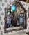A striking vintage contemporary mirror featuring exquisite handcrafted mother-of-pearl inlay, blending timeless artistry...