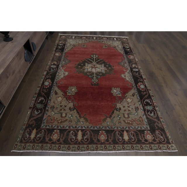 Vintage Turkish Hand-Knotted vintage rug is a semi-antique vintage area rug. The '70s Eastern region of Turkey's unique...