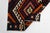 This is a vintage Turkish Oushak rug from the Mid 20th Century. The piece was hand-knotted.