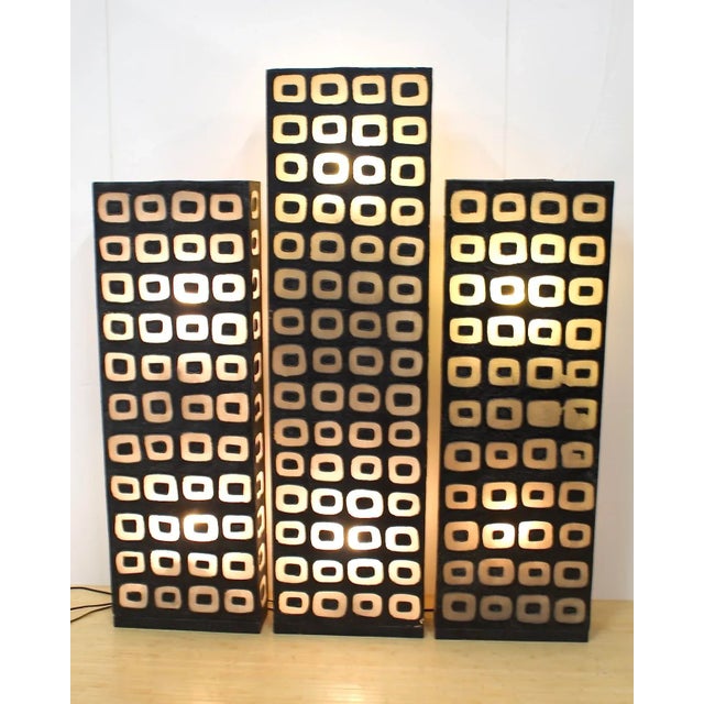 Extraordinary lighted 3 piece room divider consists of 3 rectangular shades in 2 sizes, one larger than the other two....