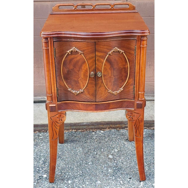 A French Louis XVI Style Mahogany Galleried Two-Door Side Cabinet. Measures 16.5" in width, 28.5" in height and 14" in depth.