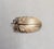 1950s or 1960s goldtone over sterling feather with loops around the base of the feather brooch with security clasp. Marked...