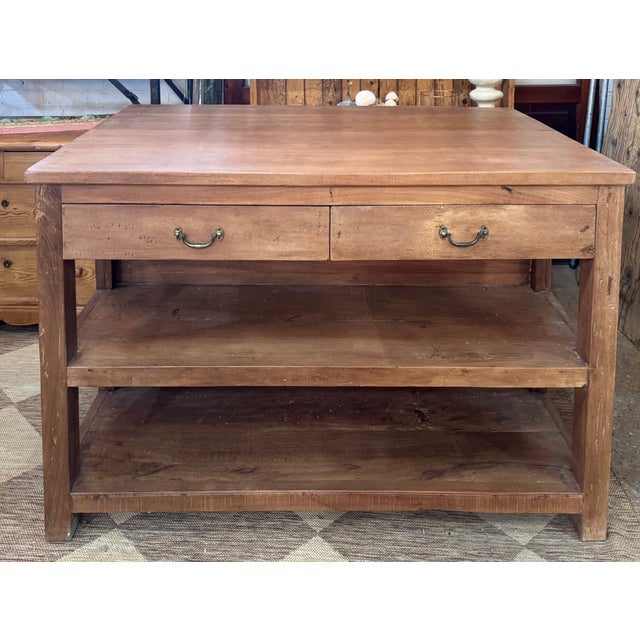 Everyday function meets handcrafted character in this rectangular kitchen island. One side offers seating for two counter...