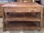 Everyday function meets handcrafted character in this rectangular kitchen island. One side offers seating for two counter...