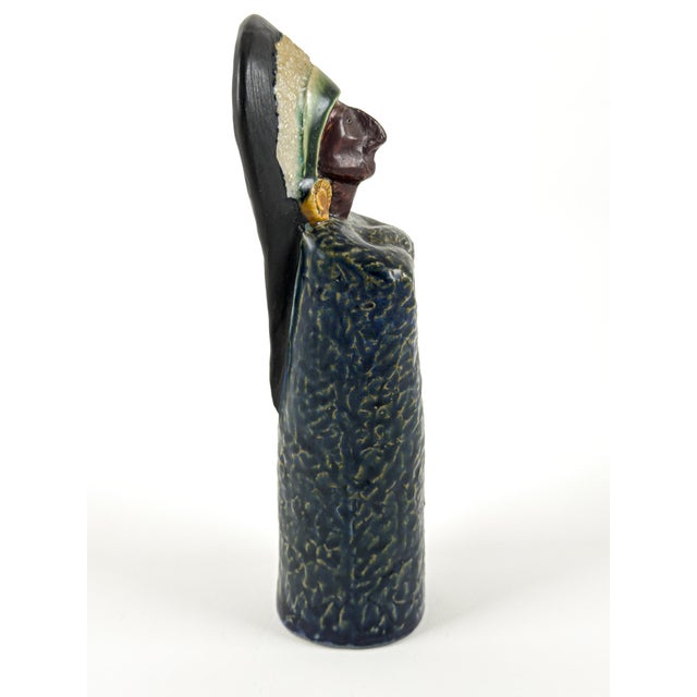 A sculptural Swedish Modern ceramic female figure produced by Höganäs Keramik, Sweden, during the 1960s. Executed in...