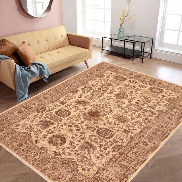 "Enhance the ambiance of your home with this magnificent Persian-influenced Turkish hand-knotted rug made by skilled...