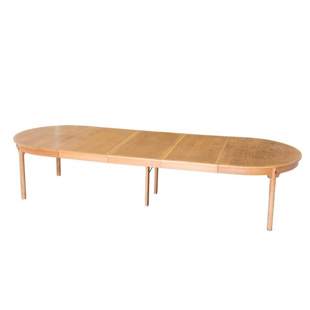 Large vintage oak oval top dining table, extending with 4 extra leaves designed in 1964 by Borge Mogensen and produced by...