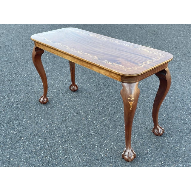Exquisite petite coffee table with stunning inlay and clawed feet