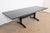 An exceptional Shaker style trestle base farmhouse extension dining table By Ethan Allen USA, Late 20th Century Solid...