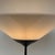 The lamp appears to be an anonymous or manufacturer attributed postmodern uplighter from the 1990s, likely Italian or...
