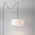 The Stretch 15" Swag Lamp is a sophisticated lighting solution that combines a weathered brass steel body with a durable...