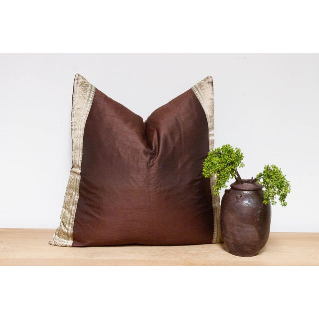 This brilliant silk euro pillow is a luxurious addition to any living room. Made out of silk with intricate borders of...