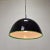 Exceptional and rare pendant designed by Gae Aulenti for Vistosi from the "Neverino" series. Hand blown Murano dark purple...