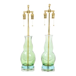 Green Glass Bottle Shaped Lamps - A Pair For Sale