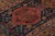 Hand-knotted in wool and originating from turkey circa 1950-1960, this 3x14 vintage runner rug features a design that...