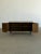 W59 D18 H30 Fully restored minimal Credenza with lots of open storage behind doors. Item features new wooden legs with...