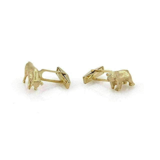 These Bear & Bull Stock Market Symbol Stud 14k Yellow Gold Cufflinks are a unique and stylish accessory for men. The...