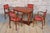 This set of four luxurious dining armchairs is a magnificent example of high French Art Deco from the 1930s. The...