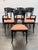 Design Plus Gallery presents a Set of Six Vintage Black Lacquer Dining Chairs by Antonio Siabau for Siabau Furniture. This...