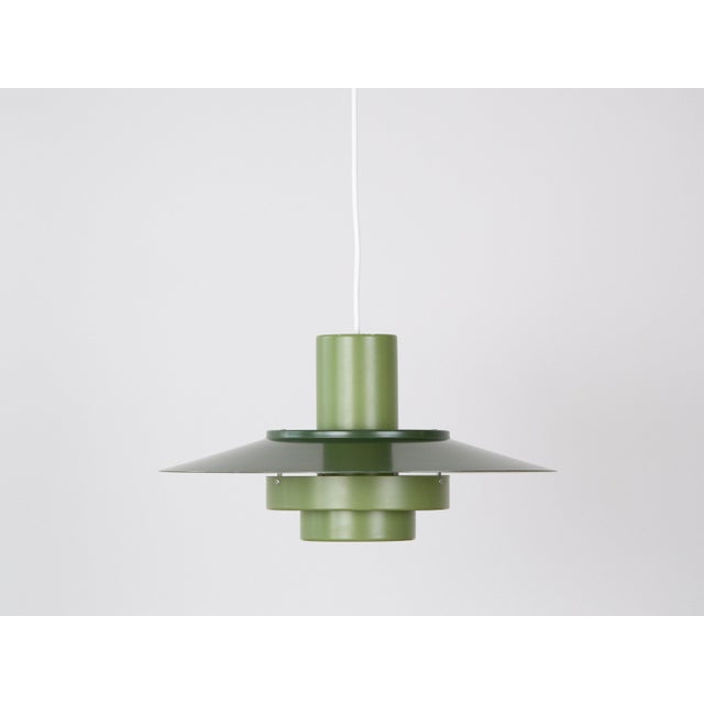 The Falcon lamp was designed by Andreas Hansen in 1969 for the Danish company Fog & Mørup. It's a classic example of...