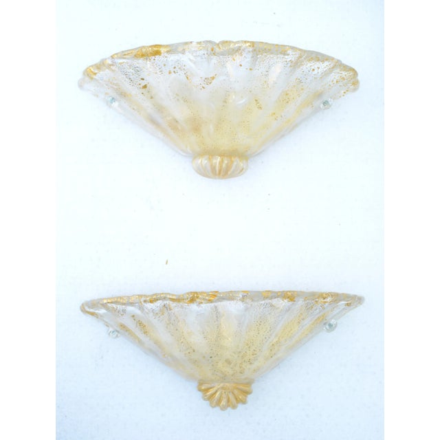 Elegant Venetian Mid- Century Modern Pair of Sconces, Wall Lamps entirely handcrafted in Murano, with an organic modern...