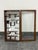Design Plus Gallery presents a Vintage Chinoiserie Wood Wall Mount Curio Cabinet. This vintage curio cabinet has a carved...