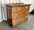 This chest of drawers has pin and cove joints, also called Knapp joints, which were only manufactured from 1869-1900...
