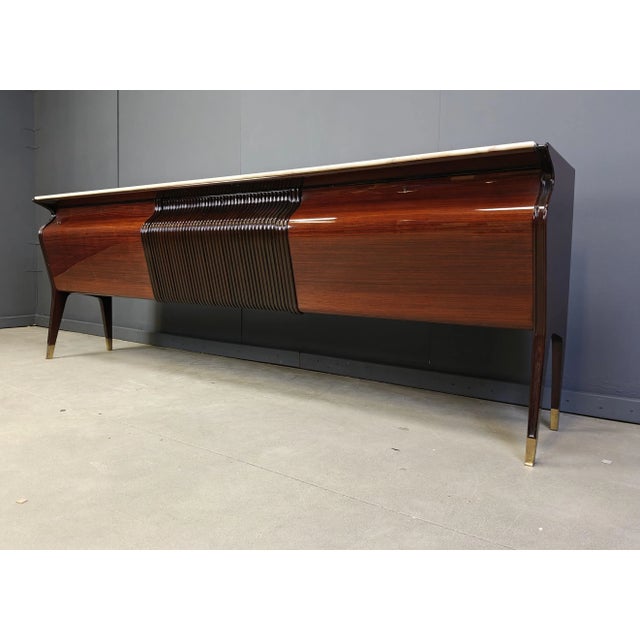 Credenza by Osvaldo Borsani for Atelier Borsani Varedo, 1950s, in Very Good conditions. Designed 1950 to 1959 This piece...