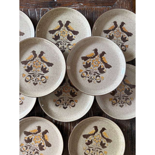 Set of 10 (10) vintage Red Wing Turtle Dove plates featuring a charming folk-art-inspired design of stylized birds,...