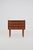 Danish chest of drawers from the 1960s, finished in warm teak veneer. The cabinet features three spacious drawers with...