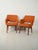 Pair of Oslosund armchairs by Kinnarps, 1950s, teak frame and original orange upholstery. Elegant pair of Oslosund...