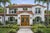 Puerta Condesa (Model 2055) – Handcrafted custom solid wood exterior double French door featuring a rectangular dual-panel...