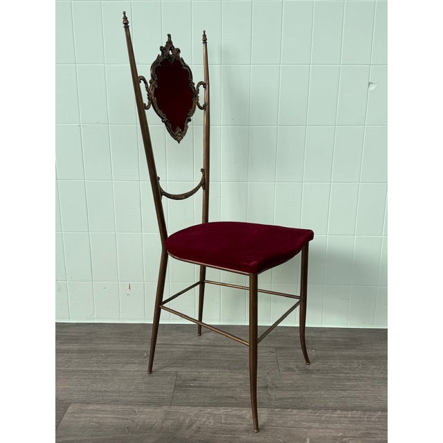 Brass dining chair for Chiavari, Italy, 1960s. Graphic design by Chiavari. Impressive Italian design, typical of the...