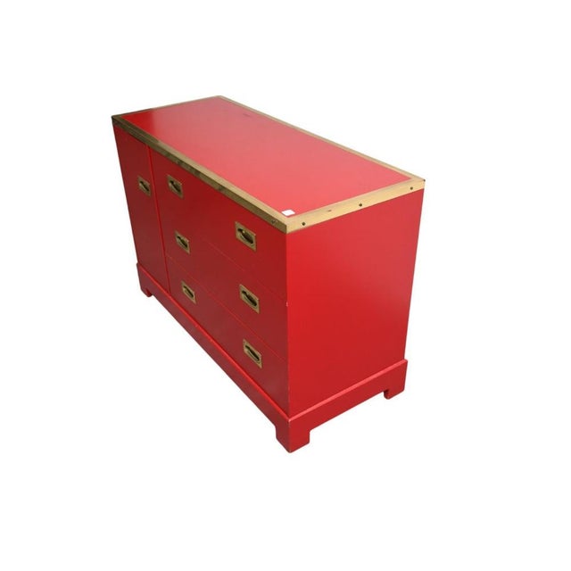 A 1970's hard to find mid-century campaign-style cabinet by Directional. The three drawer cabinet is finished in a bold...