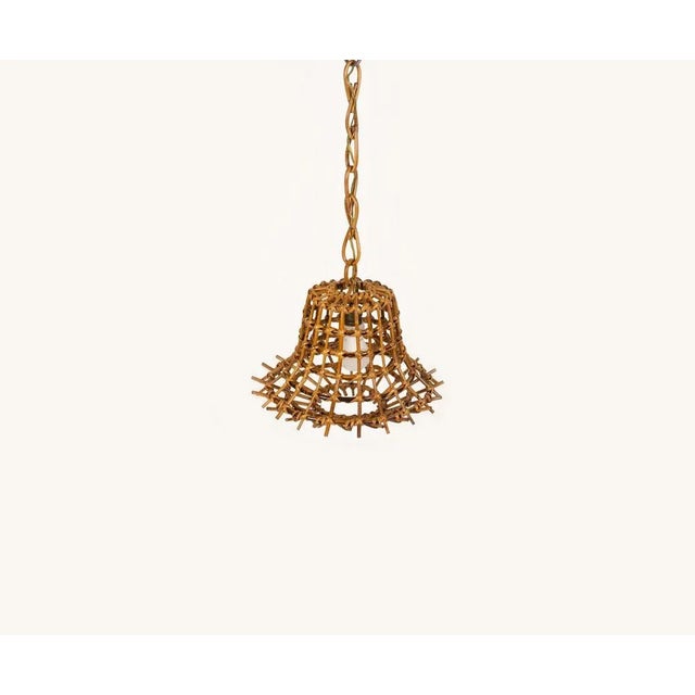 Midcentury chandelier "Lantern" in rattan and bamboo, in the style of Louis Sognot. Made in Italy in the 1960s. A...