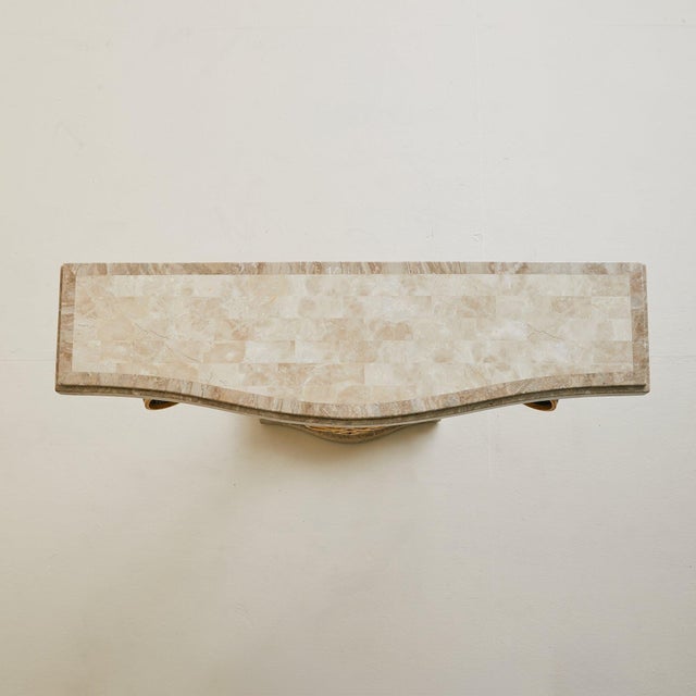 A Late 20th Century console table in tessellated marble and gilt metal, sourced in Northern Europe and crafted in the...