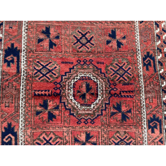 Antique Afghan Baluchi Rug With Geometric Tribal Medallion Design in Terracotta and Navy Rug For Sale - Image 6 of 11