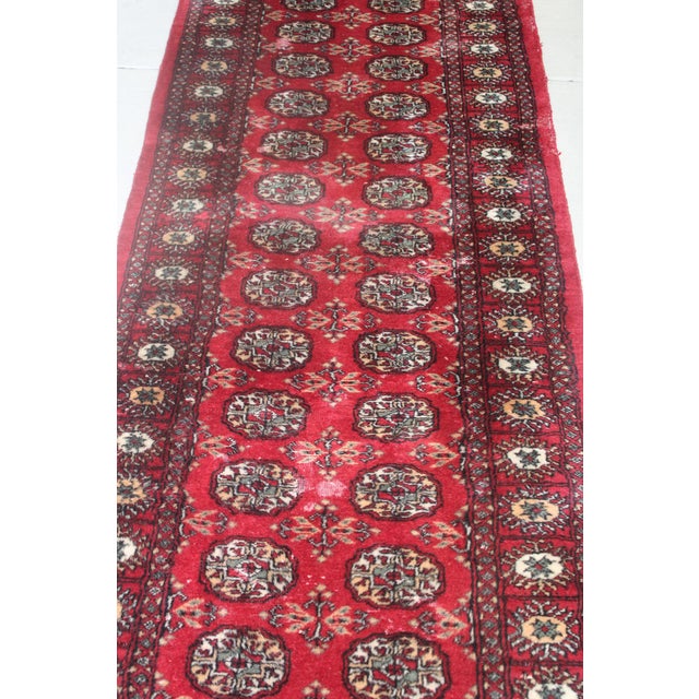 Red Vintage Hand-Knotted Wool Bokhara Runner Rug. 21'x 2'7