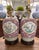 Absolutely lovely pair of famille rose, heavily-enameled ginger jar lamps in beautiful condition. Colors is a shade of...