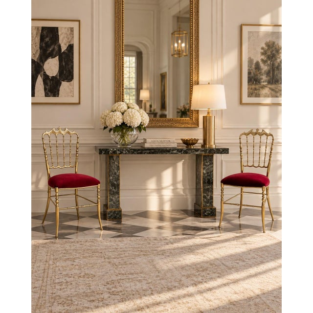 Elegant pair of vintage brass Chiavari-style side chairs distinguished by their sculptural high backs, slender proportions...