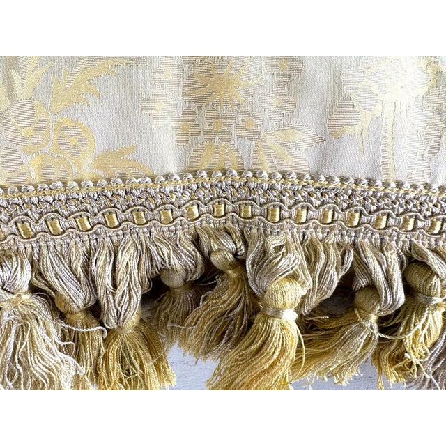 This is a pair of chinoiserie tasseled silk pillows by the silk trading Company. This chinoiserie style Silk has an Asian...