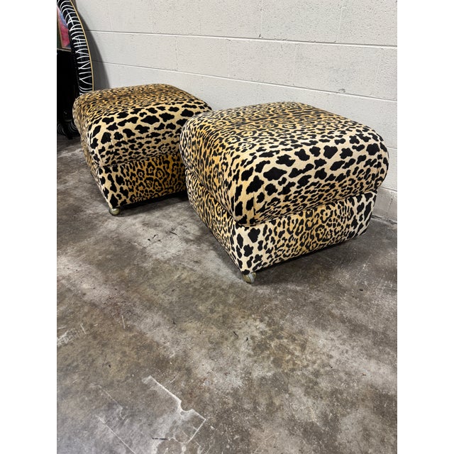 I don’t recall the maker name of the original poufs, but we reupholstered these in DV Kaufman animal print velvet. Every...