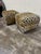 I don’t recall the maker name of the original poufs, but we reupholstered these in DV Kaufman animal print velvet. Every...
