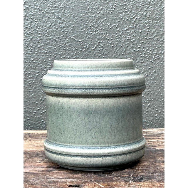 This exceptional vintage Danish studio pottery vessel embodies the timeless elegance of Scandinavian modernist design....