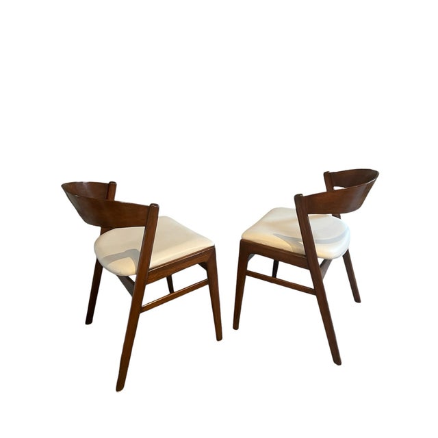 Set of two mid-century Danish dining chairs designed by Folke Ohlsson (1919-2002) for Dux, 1965, Denmark. The chairs are...