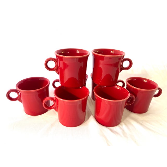 Red Fiesta ware coffee cups set of 8. Not sure if the age but they are great condition. Size 3.5 x 3.5