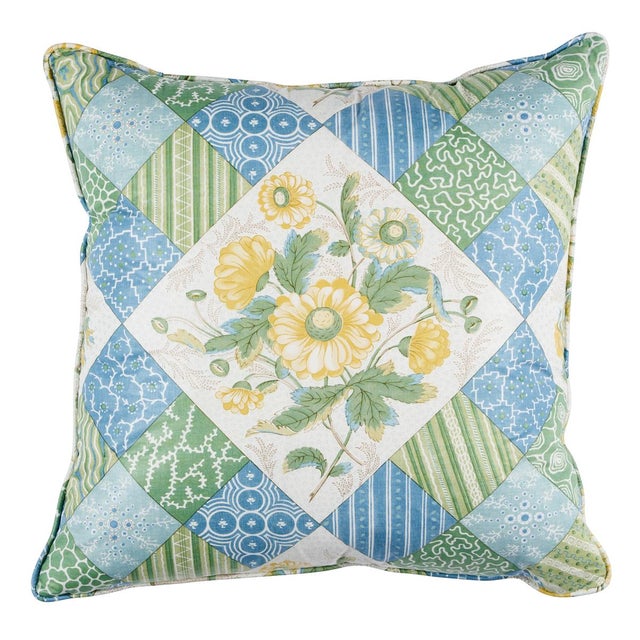 This pillow features Caldwell Patchwork with a self welt finish. Caldwell Patchwork Chintz in yellow-and-cornflower is a...
