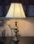 Design Plus Gallery presents a Vintage Brass Table Lamp. This traditional lamp has a tall urn-form profile with stacked...